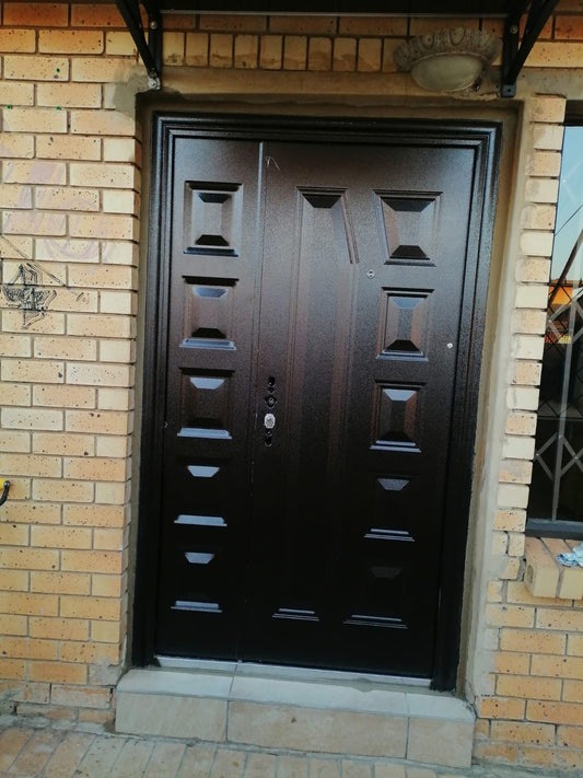 329 Golden Brown Two-Panel Pivot Security Door Installation – Gauteng