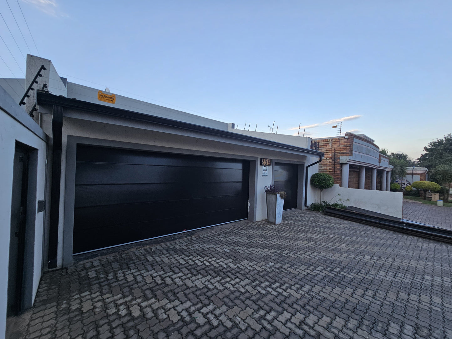 Water Ripple Insulated Steel Garage Door - Single & Double - Charcoal, Black, Walnut, Mahogany